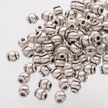 Load image into Gallery viewer, Pack of 50 Tibetan Style Barrel Spacer Beads - 4.5mm
